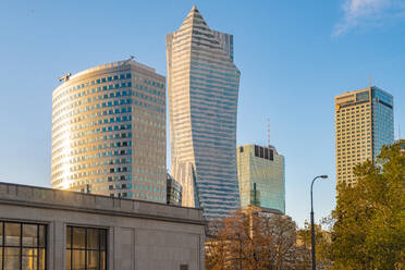 View to modern skyscrapers with Palace of Culture and Science in the foreground, Warsaw, Poland - TAMF02193