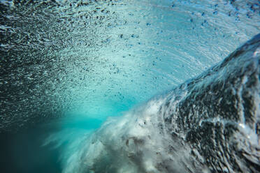 Indonesia, Bali, Underwater view of ocean wave - KNTF04301