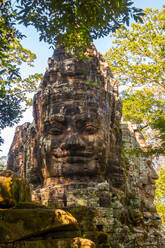 Statues at the entrance to Angkor Thom Cambodia - MINF13384