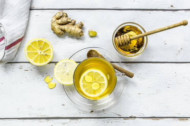 Studio shot of hot tea with ginger, lemon and honey - SARF04461