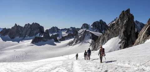France, Mont Blanc Massif, Chamonix, Mountaineers climbing Trient Glacier stock photo
