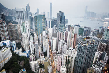 High angle view over dense cityscape with tall skyscrapers. - MINF13574