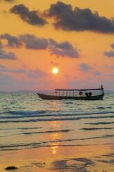 Fishing boat moored off beach south of the city at sunset, Otres Beach, Sihanoukville, Cambodia, Indochina, Southeast Asia, Asia - RHPLF13715