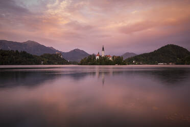 Aerial view of Bled Island with Church of the Assumption at dusk, Lake Bled, Upper Carniola, Slovenia - CUF54710