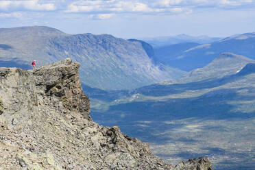 Hiker in mountains - JOHF07960