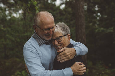 Senior couple in forest - JOHF07981