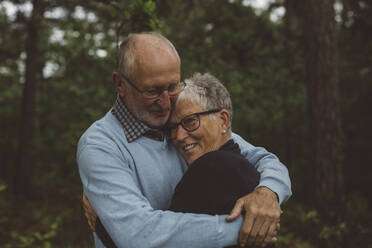 Senior couple in forest - JOHF07987