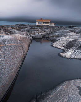 House on rocky coast - JOHF08143