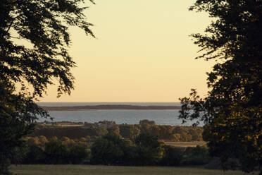 Sky at dawn over lake - JOHF08240