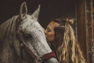 Woman with horse - JOHF08355