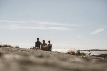 Three friends on beach - JOHF08453