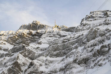 Switzerland, Appenzell, Low angle view of Santis mountain with weather station on top - ELF02141