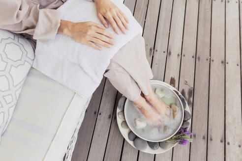 Close-up of woman having a footbath - SDAHF00525