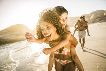 Happy family having fun on the beach - SDAHF00613