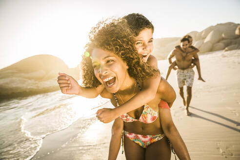 Happy family having fun on the beach - SDAHF00613