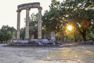 Greece, Olympia, Ruins of ancient Philippeion at sunset - MAMF01188