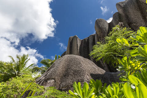 Seychelles, La Digue, Low angle view of granite cliff at Anse Source dArgent stock photo