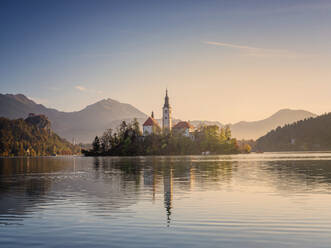 Slovenia, Bled, Lake Bled at dawn with Assumption Of Mary Church in background - HAMF00596