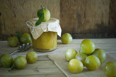 Greengages and jar of homemade plum jam - ASF06579