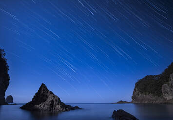 Star trails over the sea at Futou coast in Izu peninsula, Shizuoka Prefecture, Japan - CAVF75282