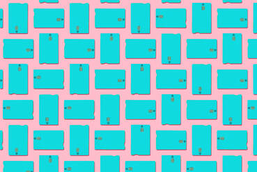 Blue contactless credit cards pattern on pastel pink background - GEMF03437