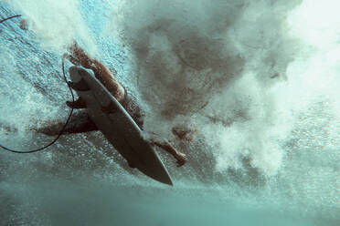 Surfer on surfboard, underwater shot - CAVF75482