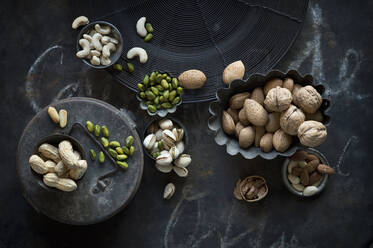 Tray and bowls of various nuts - ASF06587