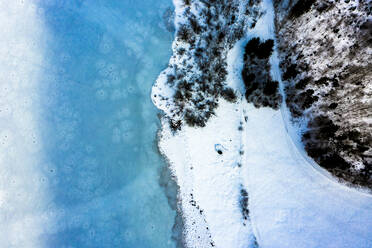 Germany, Bavaria, Reit im Winkl, Helicopter view of Weitsee und Lodensee lakes in winter - AMF07902