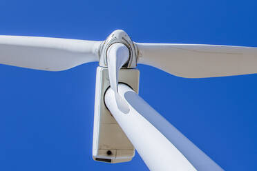 Wind Turbine in Colorado against blue sky - CAVF75603