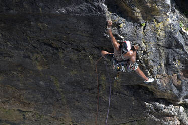 Rock climber, Mother Carey's Kitchen, Pembrokeshire, United Kingdom - ALRF01743