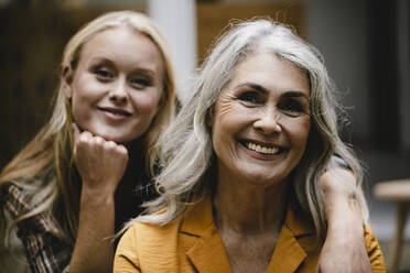 Portrait of smiling mother and adult daughter - GUSF03461