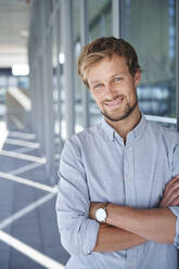 Portrait of smiling businessman - PNEF02375