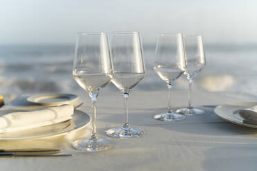 Spain, Empty wineglasses on set restaurant table - AFVF05456