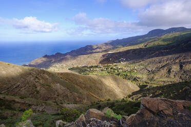 Spain, Santa Cruz de Tenerife, Alojera, Hills surrounding coastal village - SIEF09595