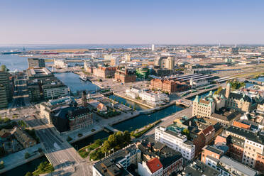 High angle view of city landscape by sea against sky - MASF16761