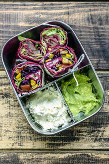 Lunch box containing beetroot wraps, cream cheese and guacamole - SARF04494
