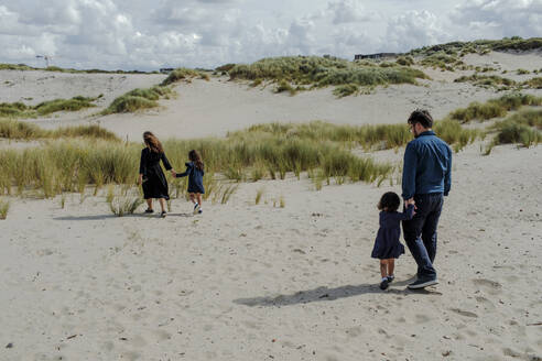 Family with two little children walking in the dunes, The Hague, Netherlands - OGF00187