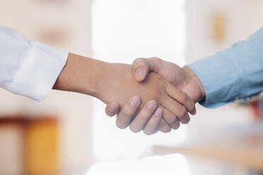 Businessmans handshake after good deal. - CAVF76294