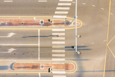 Aerial view of a man walking on the street, Burj Khalifa Blvd, Dubai, United Arab Emirates - AAEF06941