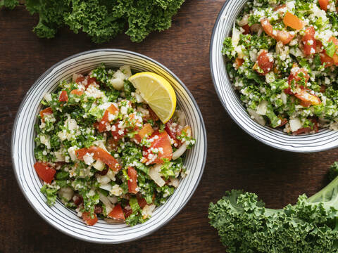 Variation of traditional tabbouleh salad with kale instead of parsley stock photo