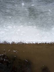 Russia, Sestroretsk, Aerial view of frozen shore of Gulf of Finland - KNTF04445