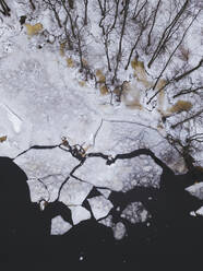 Russia, Saint Petersburg, Sestroretsk, Aerial view of icy shore of Gulf of Finland - KNTF04454