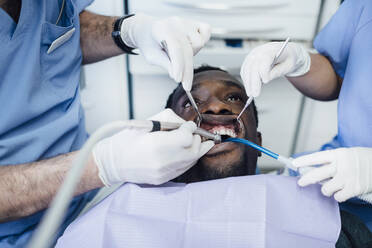 Patient getting dental treatment - JCMF00411