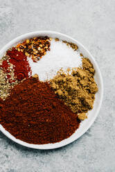 Assorted blend of spices for a chili con carne recipe - CAVF76408