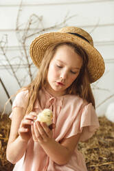 Easter kids playing with rabbits and ducks - CAVF76564