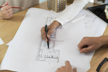 Close-up of colleagues working in architectural office - AFVF05625