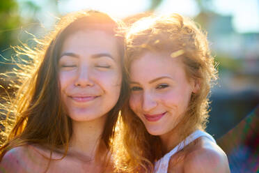 Close-Up Of Smiling Female Friends - EYF00080