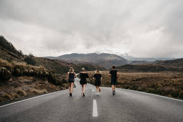 Friends Running On Road Against Sky - EYF00094