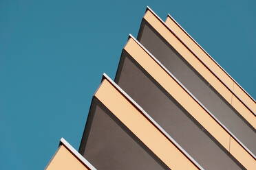 Cropped Image Of Building Against Clear Blue Sky - EYF00188