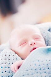 Close-Up Of Baby In Blanket - EYF00210